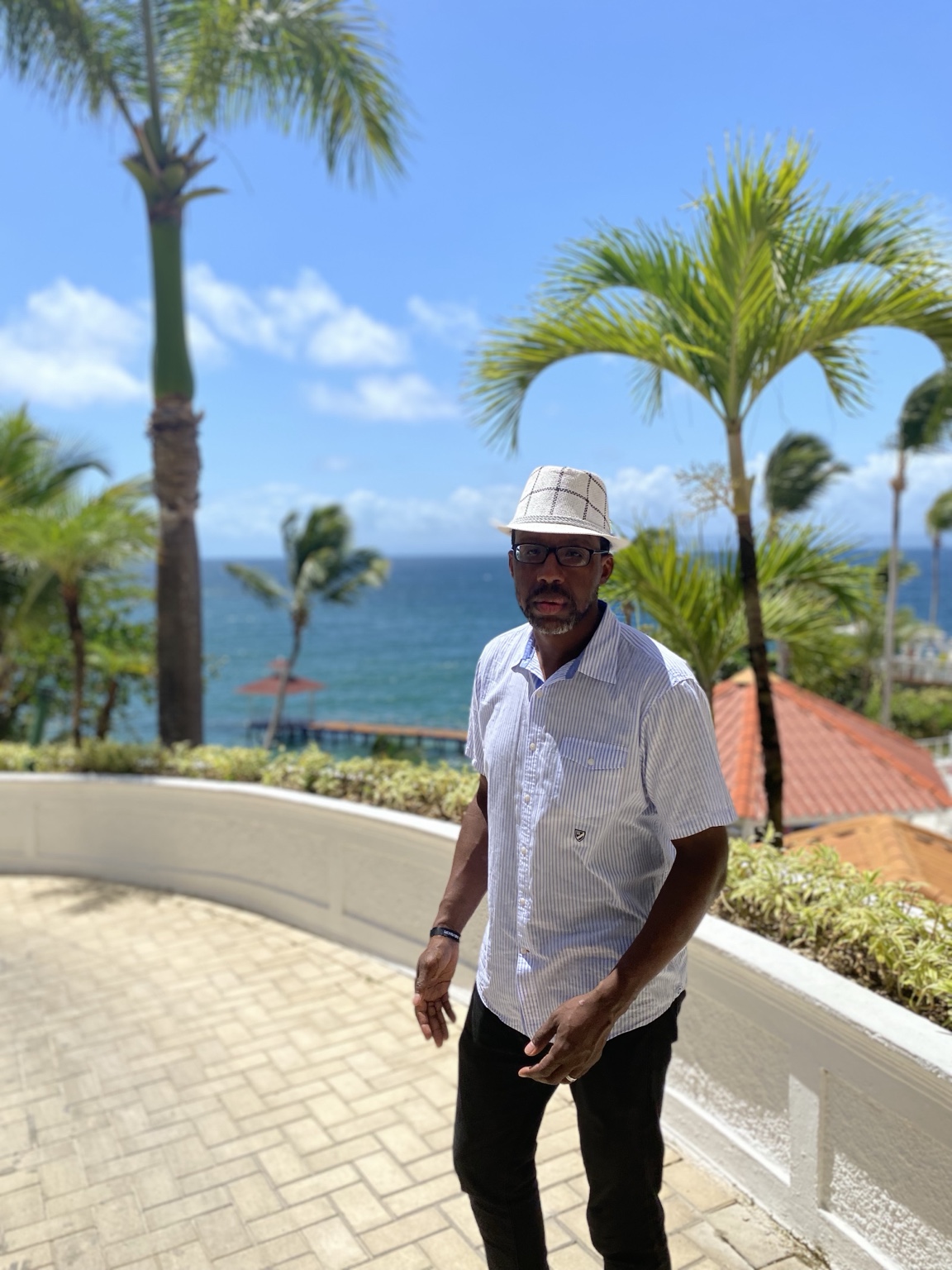 Lamar Ridgle standing near the ocean